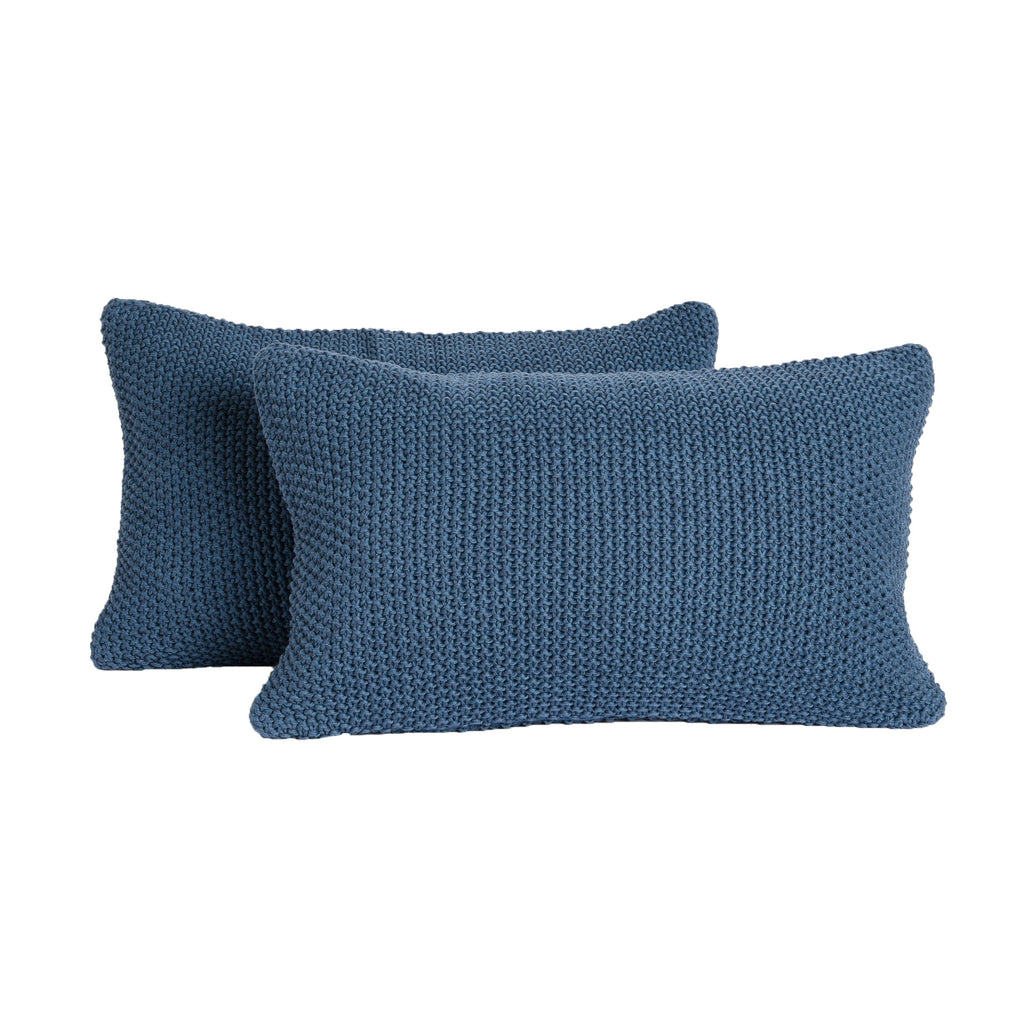 Two 12 by 20 inch Navy Cotton Knit Pillow Covers on white background