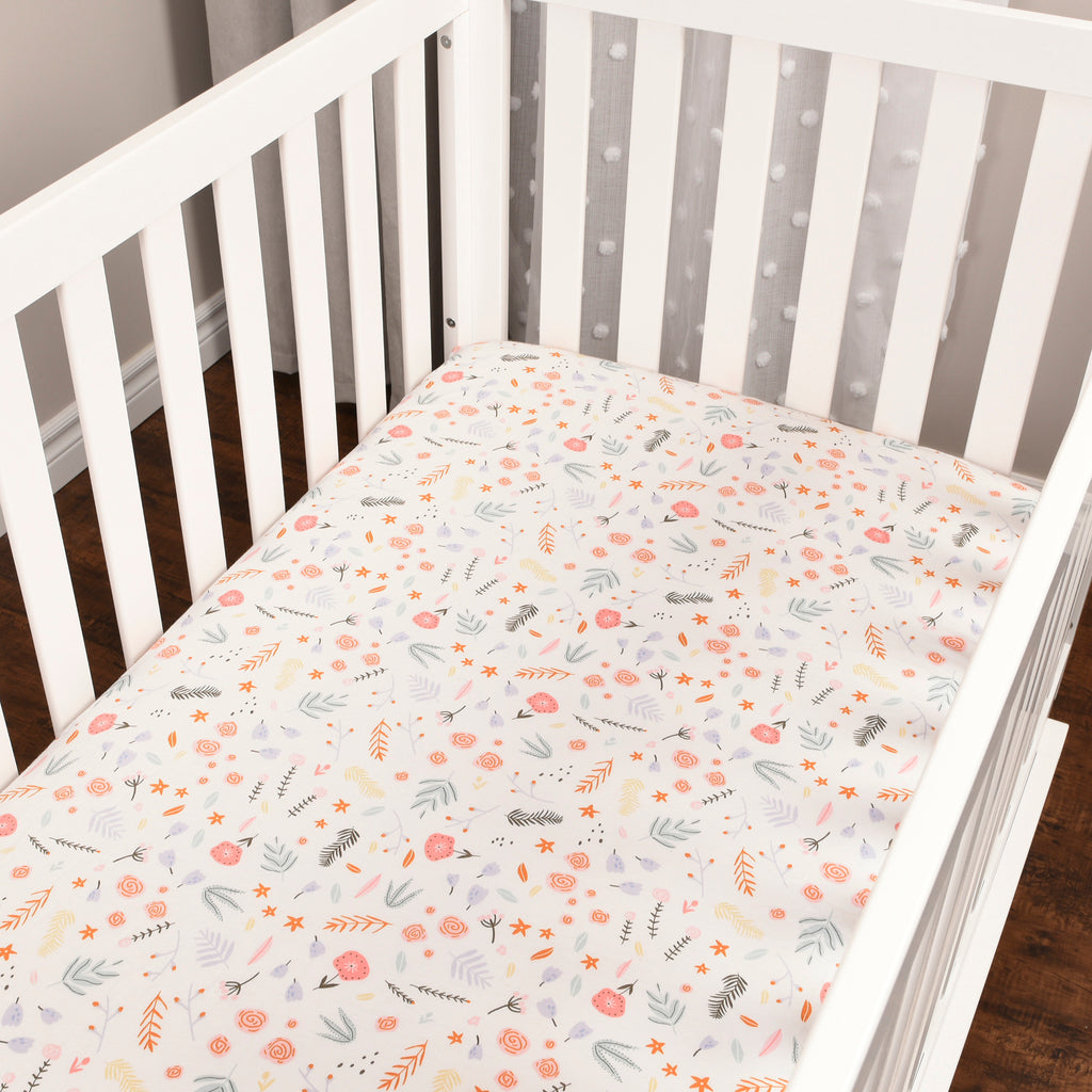Floral Fitted Crib Sheet in a crib