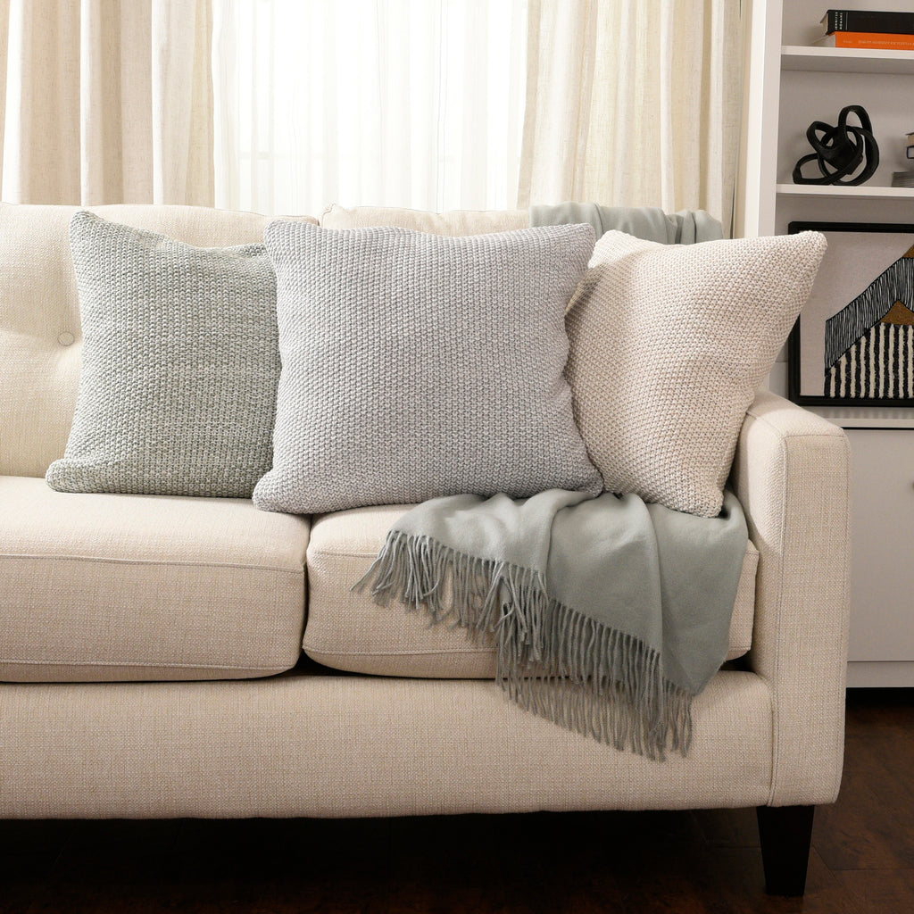 Life Comfort Knit Decorative Cushion assortment on couch