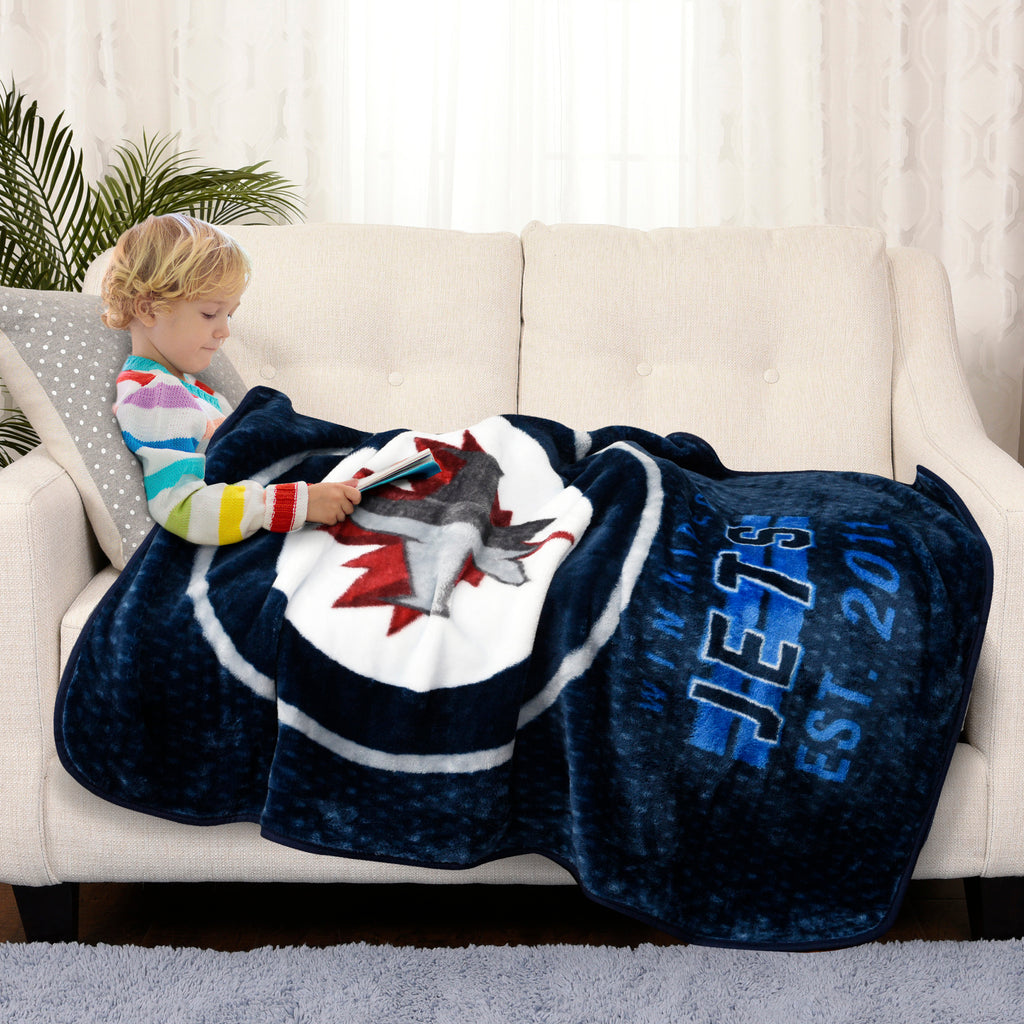 NHL Winnipeg Jets Plush Super Soft Blanket with model