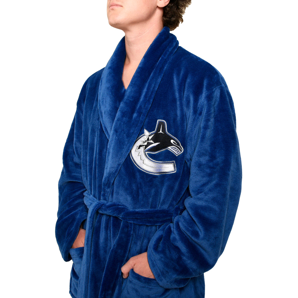 NHL Vancouver Canucks Men's Robe close up on model quarter view